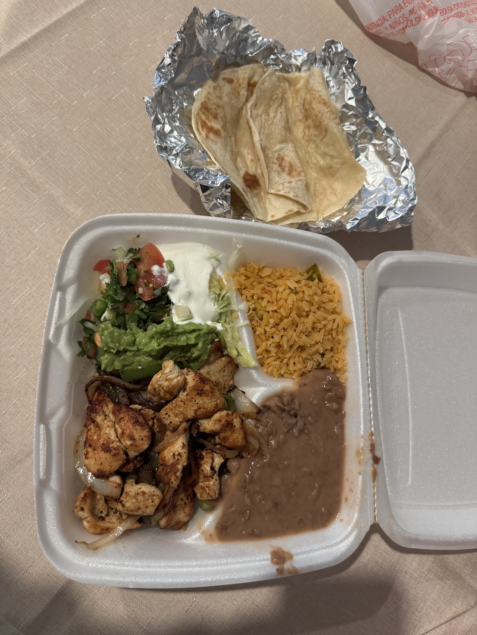 Chicken fajita to-go plate with warm tortillas